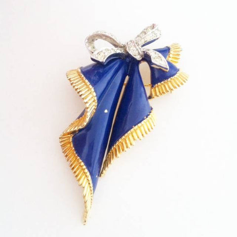 Blue bow brooch